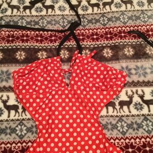 Red swimming suit with white polka dots!