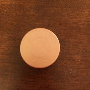 BECCA under eye brightener.