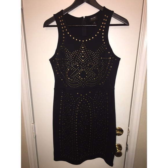 Little black dress with gold embellishments