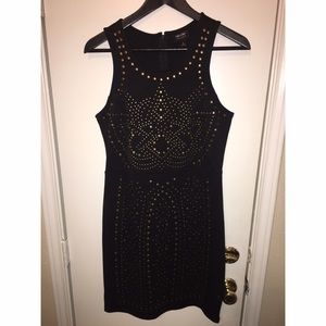 Little black dress with gold embellishments