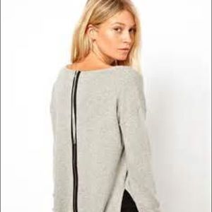 Grey sweater with zipper on back