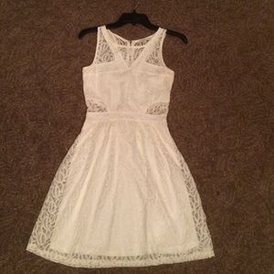 white lace sleeveless above the knee dress