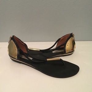 Black and gold Steve Madden sandals