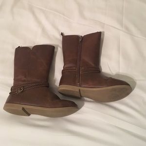 Little girl riding boots