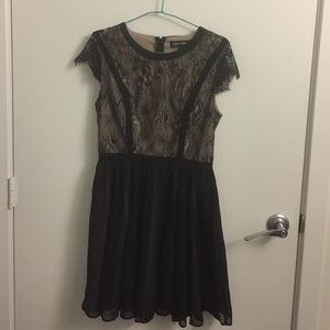 Floral black lace dress with pink undertones