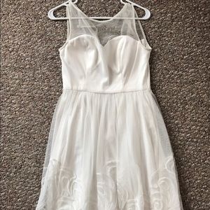 White dress with invisible neckline