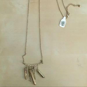 Long gold necklace