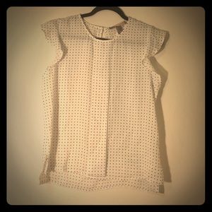 White with blue polka dot blouse