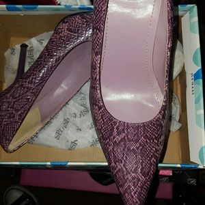 Snakeskin pumps