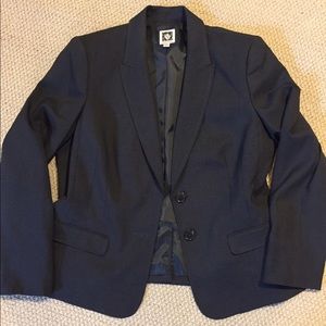 What a beautiful blazer dark gray Never worn