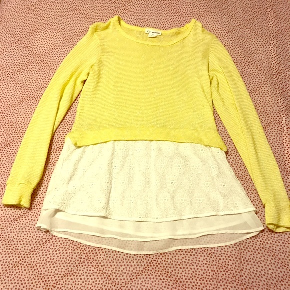 Tunic sweater with lace bottom.