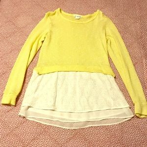 Tunic sweater with lace bottom.