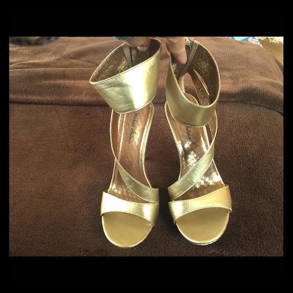 Gold Michael Antonio high heel.