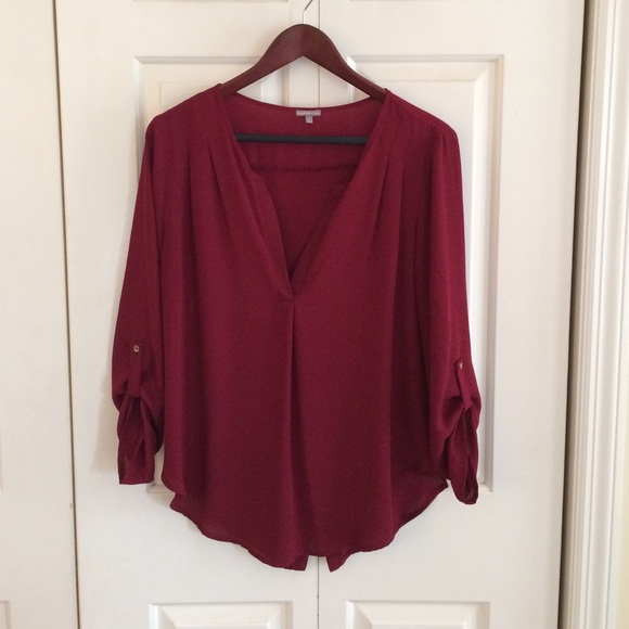 Burgundy V neck with asymmetrical open back size L