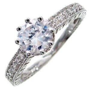 Sterling silver round cut ring with 8 side CZ's
