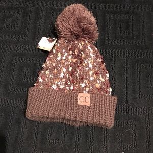 NWT warm C.C. Hat/w puff ball