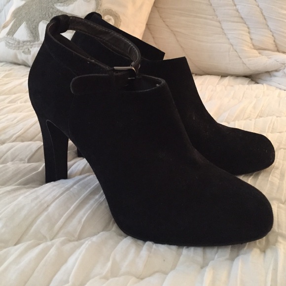 Black suede booties with ankle strap by Tahari