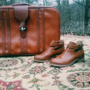 Brown leather boots.