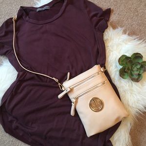 Cross body or wristlets, designer style