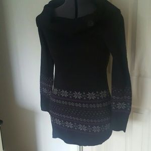 Tunic length fair Isle cowl neck sweater.