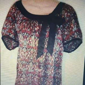 Blouse with a lovely faux tie and bow at neckline