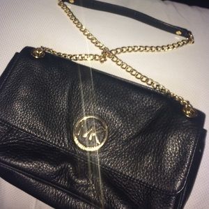 Michael kors gold chain hand bag