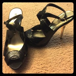 Woman's size 7 "bakers" black & Gold 5' heels.