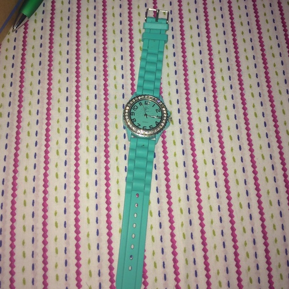 aqua and silver watch