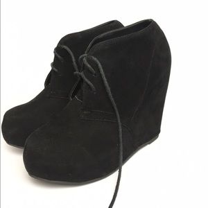 Black wedge booties