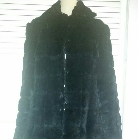 Black knee-length genuine rabbit coat.