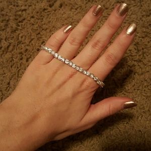 Never worn! Sterling silver tennis bracelet.