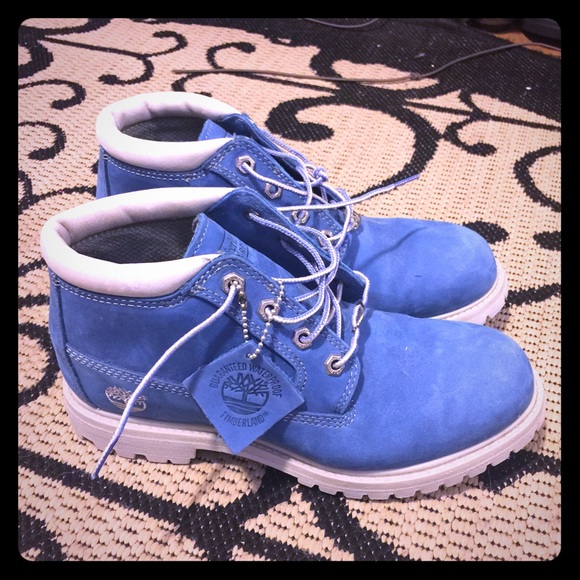 Blue and grey timberland boots