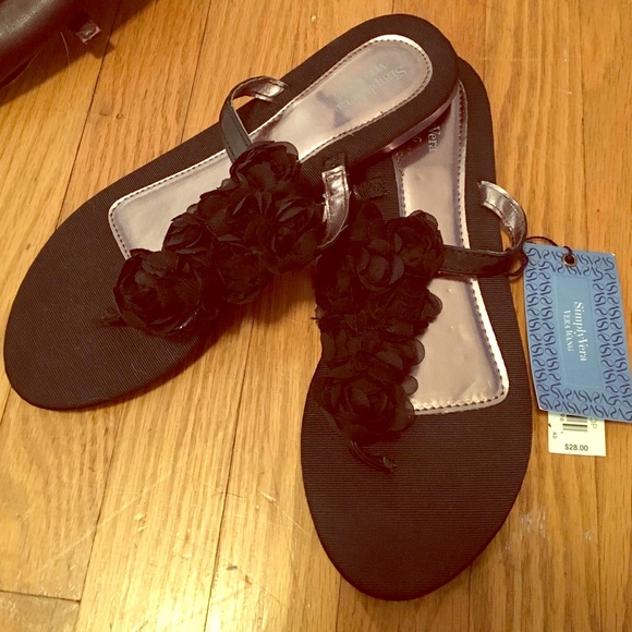 Black rose flip flop sandals.