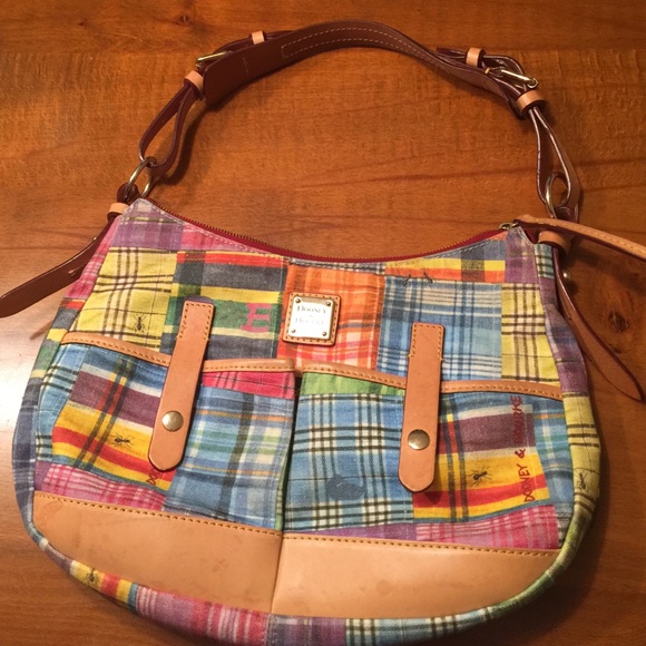 Dooney and Bourne leather and canvas handbag. - Picture 1 of 1