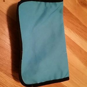 Small blue make up bag