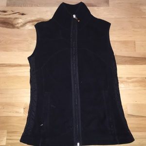 Black fleece vest by Lucy