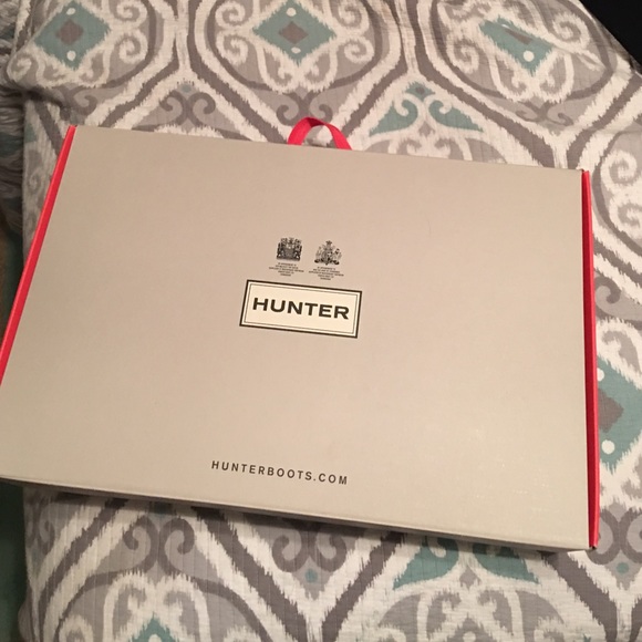 Red tall Hunter rain boots