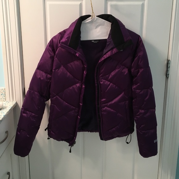A purple North Face winter jacket