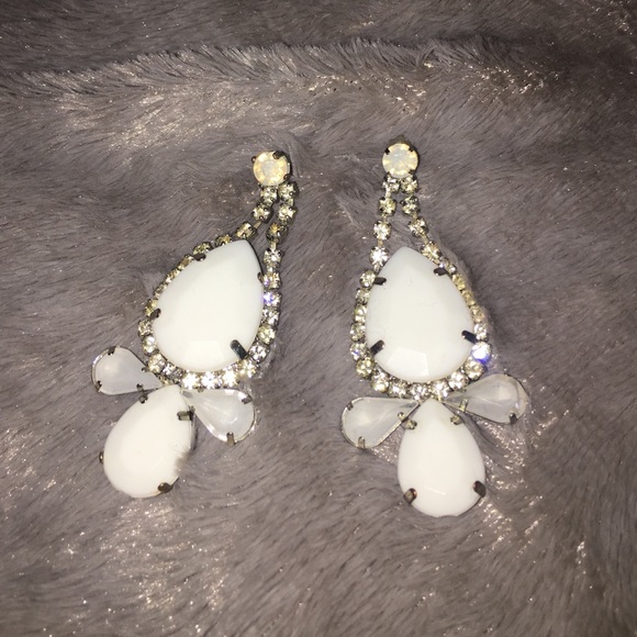 White statement earrings