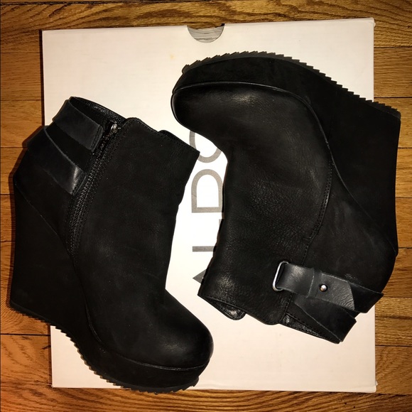 Black leather wedge ankle boots by Aldo $90