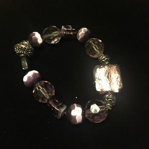 Purple bracelet with silver tones