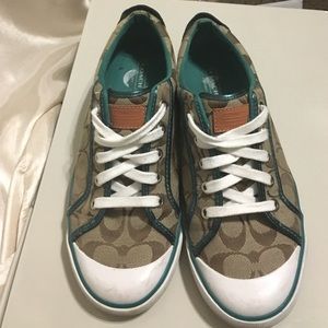 Teal and Brown Coach shoes.