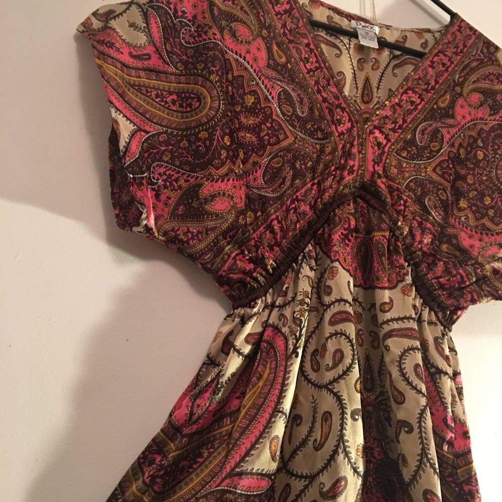 Soft, flowy paisley top.