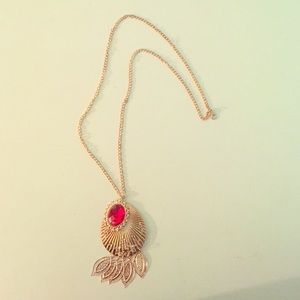 Long tribal necklace.