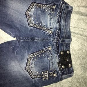 Size 26 Boot cut Miss Me jeans.