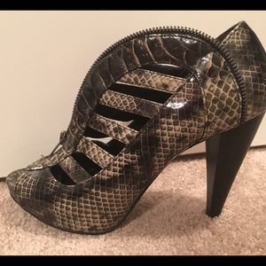 Open toe snake skin heels
