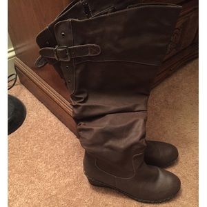 Knee length wedge boot.