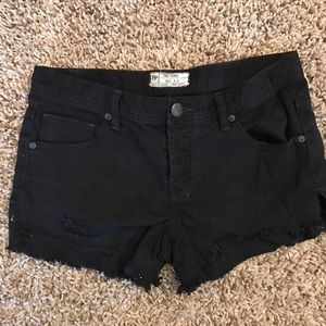 Free people black cut offs.