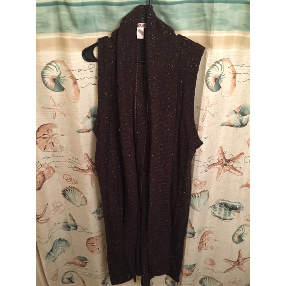 Long sleeveless cardigan.