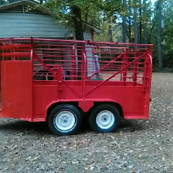 A red horse trailer
